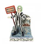 Beetlejuice trônant sur sa pierre tombale lumineuse – signé Jim Shore